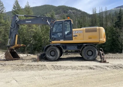2012 John Deere 220DW Wheeled Excavator Side 1